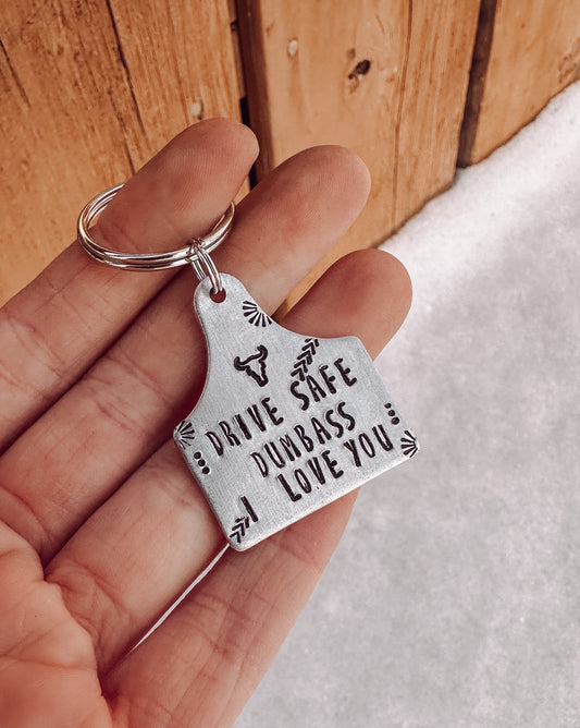 Ready to ship AS Is "Drive Safe Dumbass" Large Cow Tag Keychain